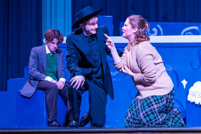 Students perform onstage
